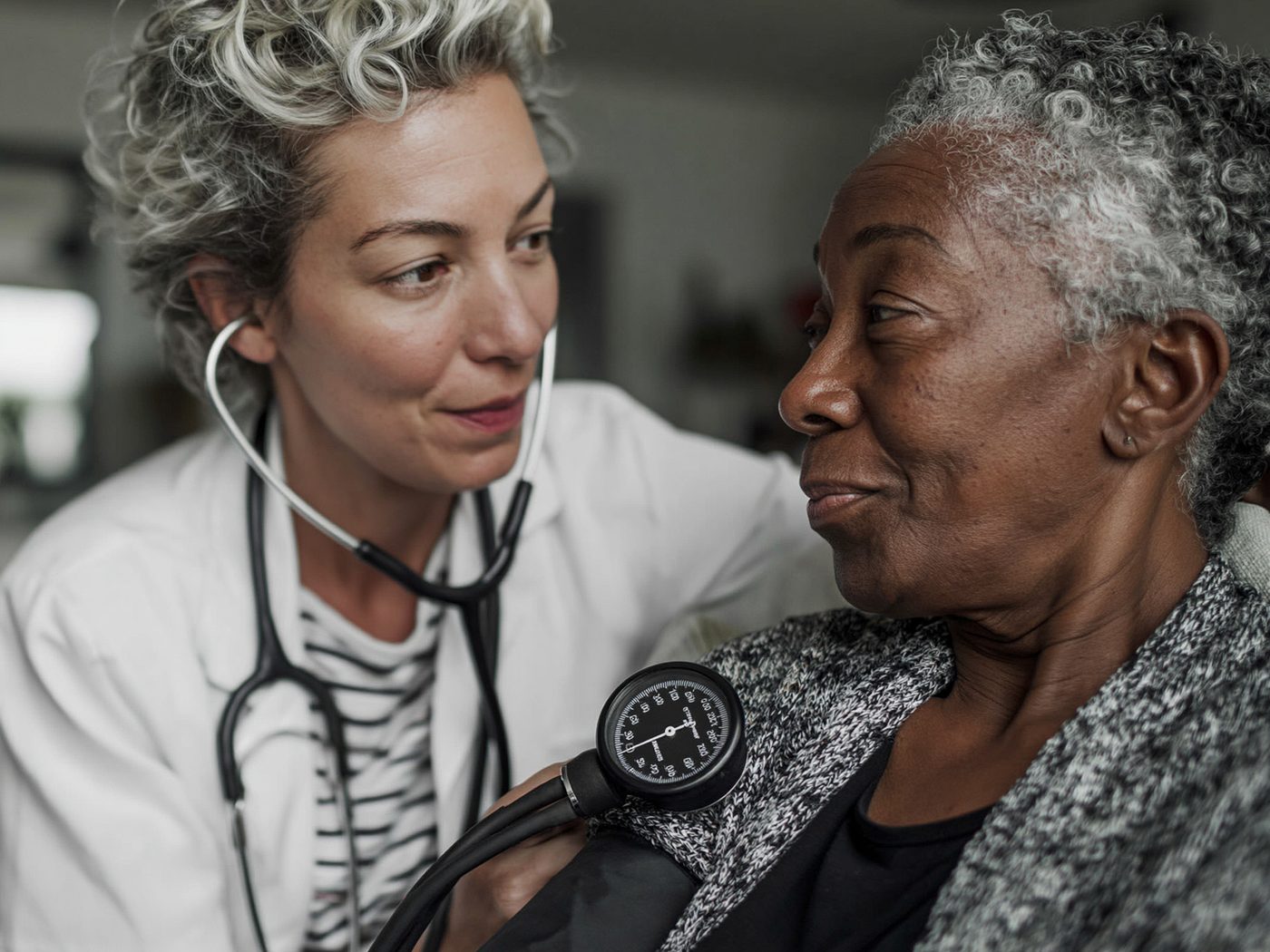 Home health nurse providing skilled care to a patient at home