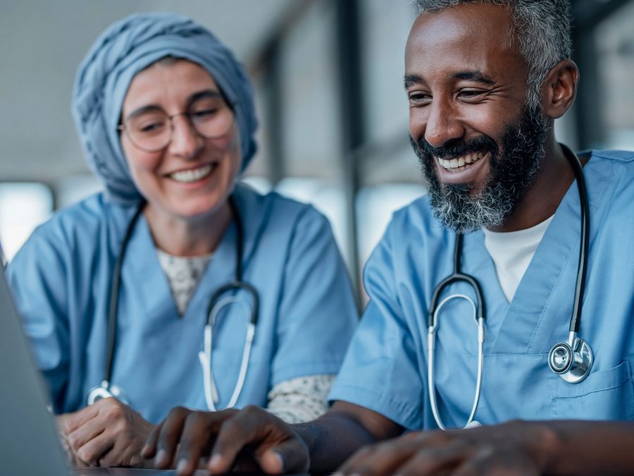 Two Kassy Health clinicians collaborating on a care plan